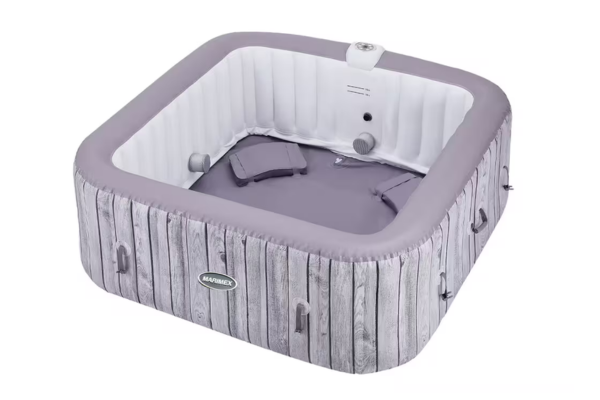Quadratischer aufblasbarer Whirlpool von Marimex mit grauer Holzoptik, weißem Innenbecken, gepolsterten Kopfstützen und Bedienfeld
